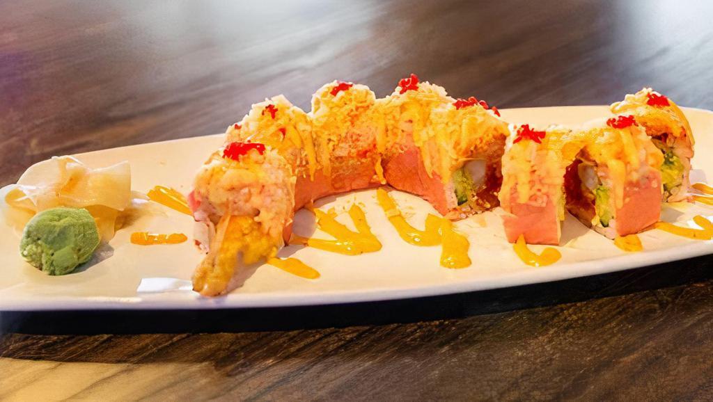 Hq Roll · Golden brown shrimp, HQ signature sauce, cucumber, seaweed paper--topped with lobster salad, tobiko, spicy mayo