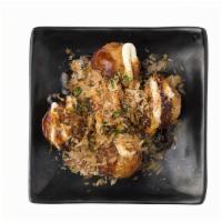 Takoyaki · Deep-fried minced octopus topped with Japanese mayo, savory sauce & fish flakes