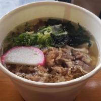 Udon Soup · Thick udon noodles with vegetables boiled in udon broth and choice of meat: chicken, pork, b...