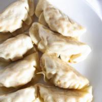 Gyoza Plate · Ten seasoned pork dumplings served with our house dipping sauce.