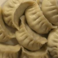 Steamed Dumplings (8Pcs .) 水饺 · Homemade Pork dumplings