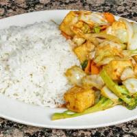 Hot & Spicy Tofu · A favorite vegetarian dish. Lightly fried hot and spicy tofu  served over steamed rice with ...