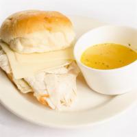Turkey Melt · House Turkey, Dipped in our House Chicken Broth, Melted Swiss Cheese, Served on a Toasted Bu...
