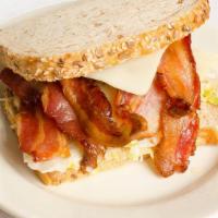 L.T. · Thick Crispy Bacon, Served on with Lettuce, Tomatoes, Swiss Cheese, and Mayo.
Served on Whol...