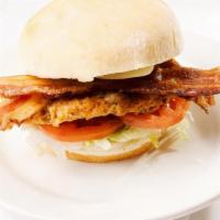 Chicken Club Bacon · Golden Fried Chicken Breast with House Bacon and Ranch Dressing. Served on a Toasted Bun, wi...