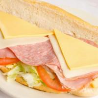 Deli Sub. · Ham, Salami, Swiss & American Cheese.
Served on a Toasted Bun, with Lettuce, Tomatoes, and m...