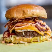 Soulful Burger · Beef patty topped with bacon, fried egg, lettuce, tomato, pepperoncini, cheddar cheese with ...