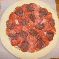 Cardiac Carnivore (Large) · Mozzarella, Italian sausage, salami, canadian bacon, pepperoni & 90% lean fresh beef.