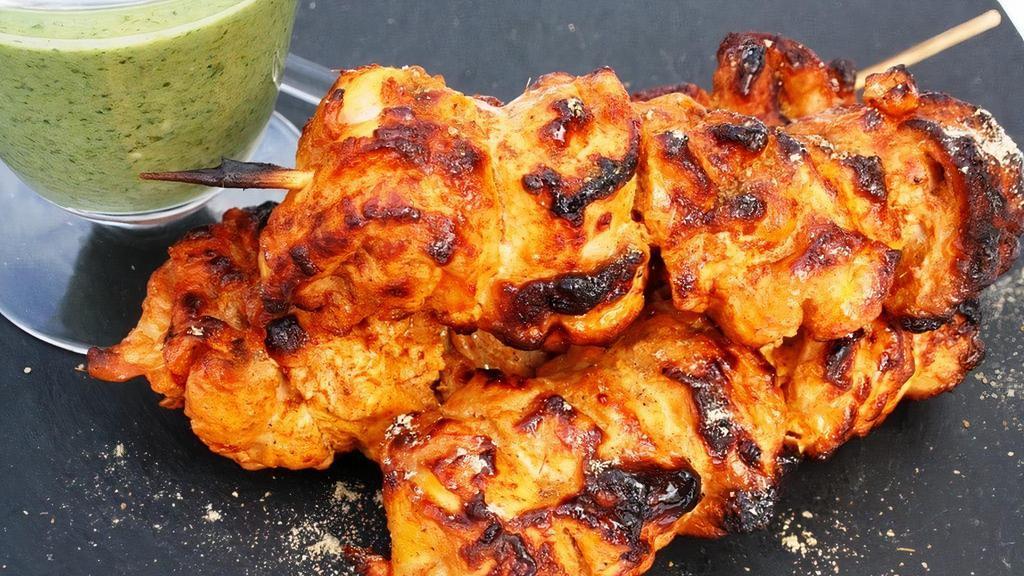 Tandoori Chicken Tikka · Tender chicken fillets marinated in yoghurt, tandoori spices and cooked in tandoor
