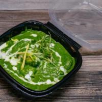 Saag Chicken · Spinach cooked with onion, garlic, enhanced with spices and cream