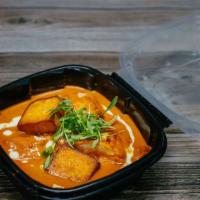 Paneer Butter Masala · Indian cottage cheese in a rich creamy tomato sauce flavored with fenugreek leaves
