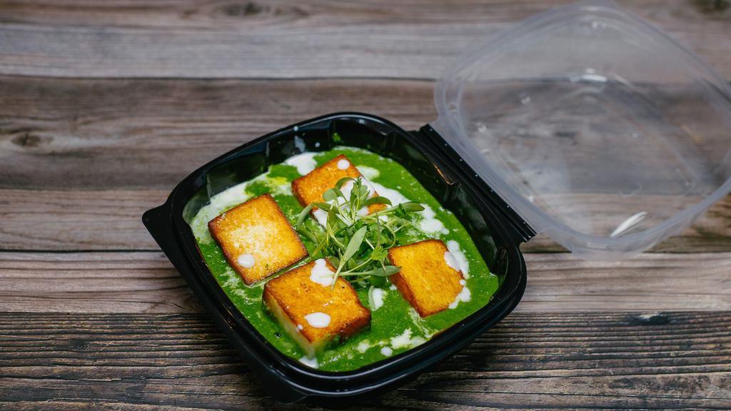 Saag Paneer  · Cottage cheese cooked with spinach, onion, garlic, enhanced with spices and cream