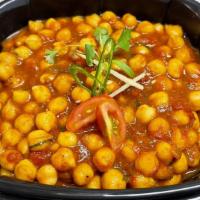 Chana Masala · Chickpea cooked in an authentic homemade spices with onion tomato gravy