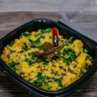Dal Kale · Mixed lentils slow cooked and tempered with onion, ginger, garlic and fresh kale and tomatoes