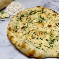 Garlic Naan · Flatbread with touch of garlic and freshly chopped coriander