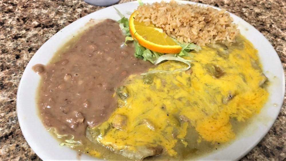 Chile Verde Smothered Burrito · Beans and green peppers, smothered in chile Verde sauce, topped with cheese.