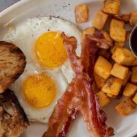 Two Eggs Any Way · bacon, breakfast potatoes, grilled bread