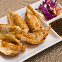 Pot Stickers · 6 Deep fried pot stickers stuffed with pork and veggie serves with sesame soy sauce.