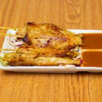 Chicken Satay · Gluten free. 4 skewers of marinated chicken serve with peanut sauce.