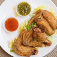 Chicken Wings · Gluten free. 5 pieces of deep fried marinated chicken wings serve with sweet chili sauce and...