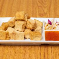 Golden Tofu · Gluten free. Deep fried golden brown tofu serve with plum sauce with ground peanut.