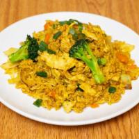 Curry Fried Rice · Gluten free. Stir-fried rice with carrot, broccoli, cabbage, white onion, green onion, tomat...