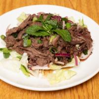 Gluten Free Beef Salad / Yum Nuea · Grilled sliced beef, shallots, white onions, green onions, mints leave, rice powder and mixe...