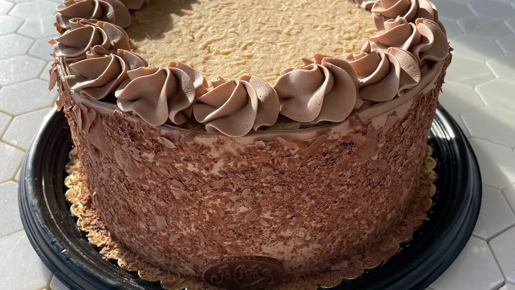 German Chocolate Torte · Light German chocolate cake with German filling (coconut and brown sugar). Iced in chocolate Swiss buttercream.