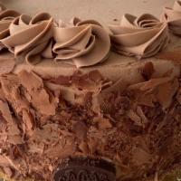 Chocolate Mousse Torte · Chocolate fudge cake with fudge filling and a thick layer of dark chocolate mousse in the ce...