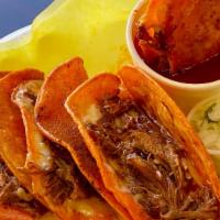 5 Queso-Birria Tacos · Marinated beef and cheese grilled tacos. Served with birria broth, onions and cilantro on th...