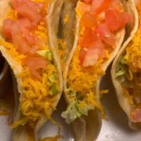 3 Hard Shell Chicken Tacos W/Rice And Beans Plate · 3 Crunchy chicken tacos with cheese lettuce and tomato. Includes rice, beans and sour cream.