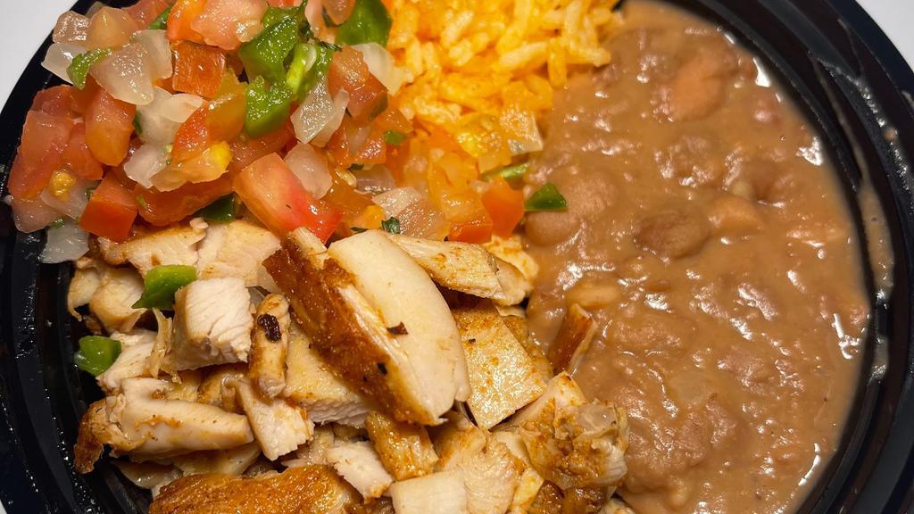 Carnitas Bowl · Rice, beans & pico de gallo.