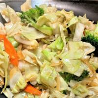 Steamed Veggies · Carrots, Onions, Broccoli and Cabbage.