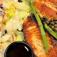 Salmon Teriyaki · Two pieces of salmon served with asparagus and capers.