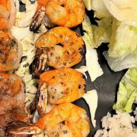 Shrimp Teriyaki · Skewered shrimp (8pcs) served with rice and salad.