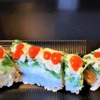 Blue Hawaiian Roll · Inside: Shrimp tempura, spicy crab, avocado, cucumber. Top: seaweed salad and wasabi mayo an...