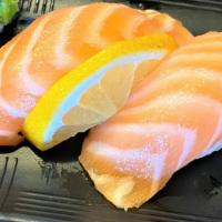 Salmon Nigiri · These items contain raw seafood, consuming these items may increase your risk of food-borne ...