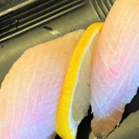 Yellow Tail Nigiri · These items contain raw seafood, consuming these items may increase your risk of food-borne ...