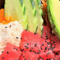 Tuna Poke Bowl · Fresh tuna, radish, carrots, crab meat, cucumber, avocado, seaweed salad, rice, masago, ponz...