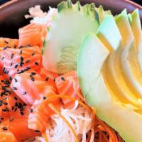 Salmon Poke Bowl · Fresh salmon, radish, carrots, crab meat, cucumber, avocado, masago, seaweed salad, rice, po...