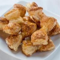 Zu Zus (Dozen) · A Bowtie of Puff Pastry glazed with honey and Cinnamon