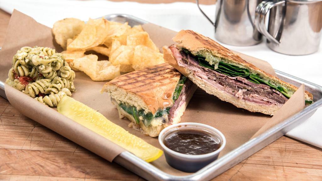 Tuscano · Roast beef, salami, black forest ham, Mozzarella, spinach, mayo, pesto and side of balsamic to dip.