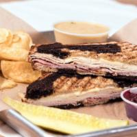 Monte Cristo · Our version - grilled not fried. Turkey, black forest ham, Swiss, dijon mustard, with a side...
