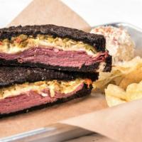 Southwestern Reuben · Corned beef, Swiss, sauerkraut, green chile and chipotle mayo served on our thick cut black ...