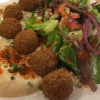 Falafel · 6 falafel balls with your choice of 2 mediterranean sides, fresh mixed greens tossed with ex...