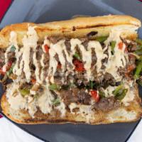 Philly Cheesesteak Sub · We Grub favorite: Cheese, onion, green bell peppers.