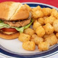 Salmon Burger With Tots · Lettuce, tomato, grilled onion.