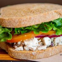 Flatirons Chicken Salad · Chunks of 100% white chicken meat in a mayonnaise dressing with spicy pecans, red onion, let...