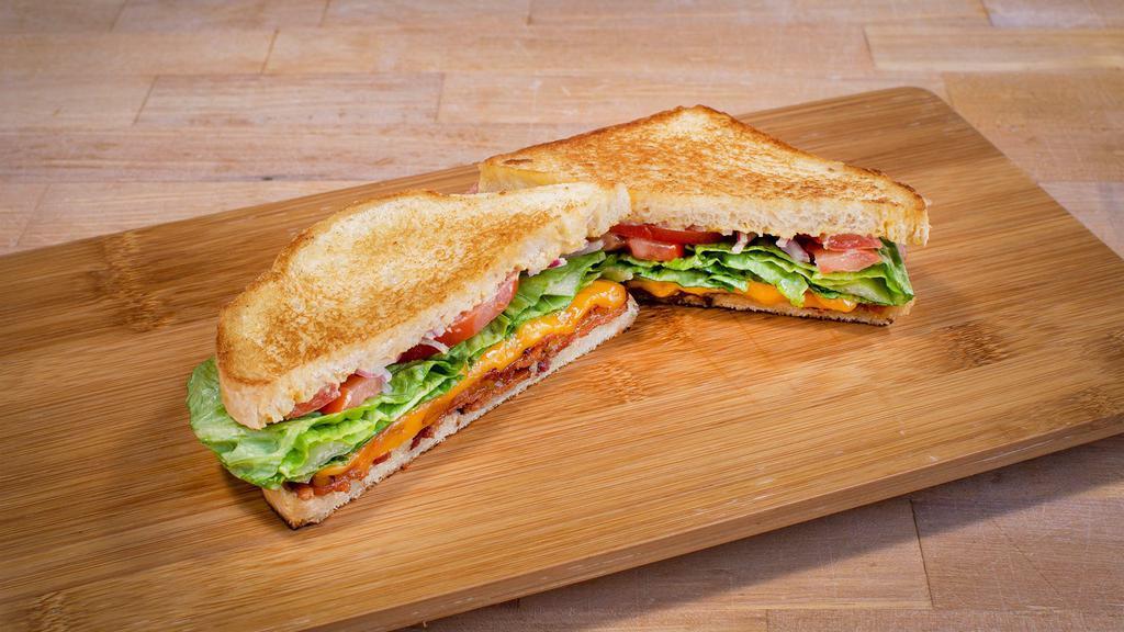 Blt · Applewood smoked bacon, mayonnaise, lettuce and tomato, sandwich salt - served on Honey Whole Wheat bread.