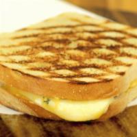 Grilled Cheese · Slices of our cheddar cheese grilled to perfection on Honey Whole Wheat bread.